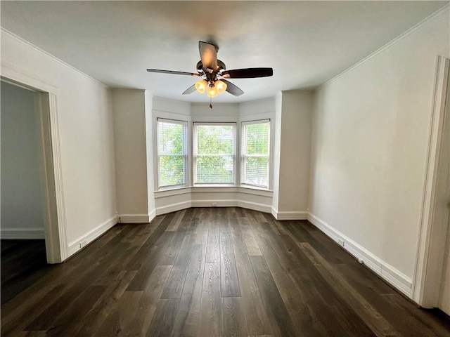 808 Center St, Horseheads, NY 14845 - empty room featuring ornamental molding, dark wood-style floors, baseboards, and ceiling fan
