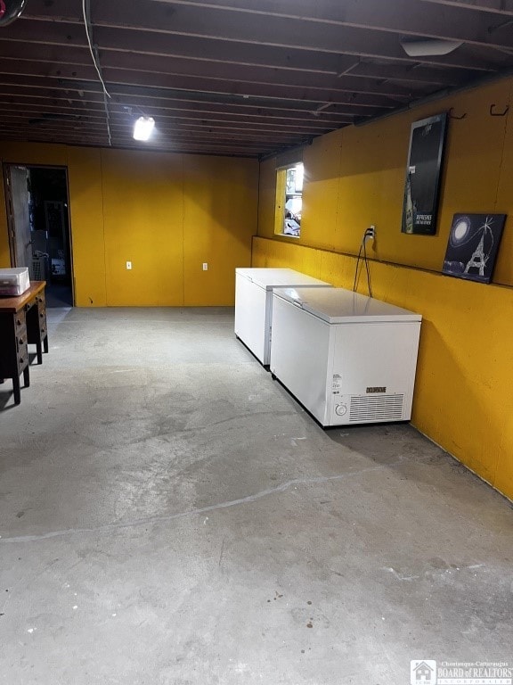 11604 York Rd, Hanover, NY 14136 - below grade area with refrigerator and washing machine and dryer