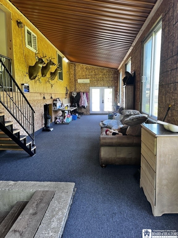 11604 York Rd, Hanover, NY 14136 - living area featuring wooden ceiling, plenty of natural light, vaulted ceiling, french doors, and stairs