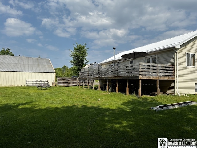 11604 York Rd, Hanover, NY 14136 - view of grassy yard with a deck and an outbuilding