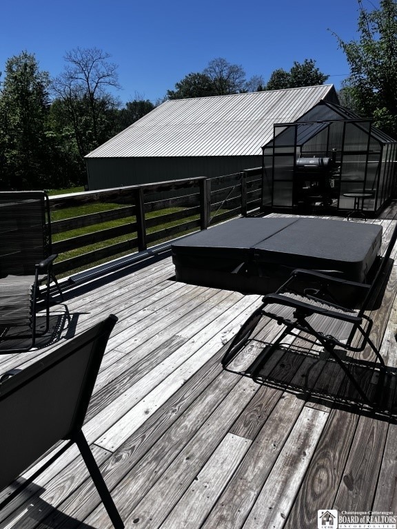 11604 York Rd, Hanover, NY 14136 - wooden deck featuring a greenhouse and an outdoor structure