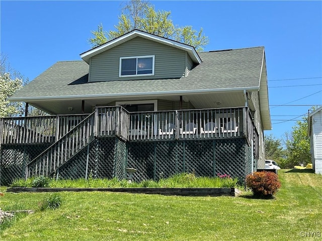 2055 Fitzgerald Pt S, Otisco, NY 13110 - back of property with roof with shingles, a lawn, a porch, and stairs