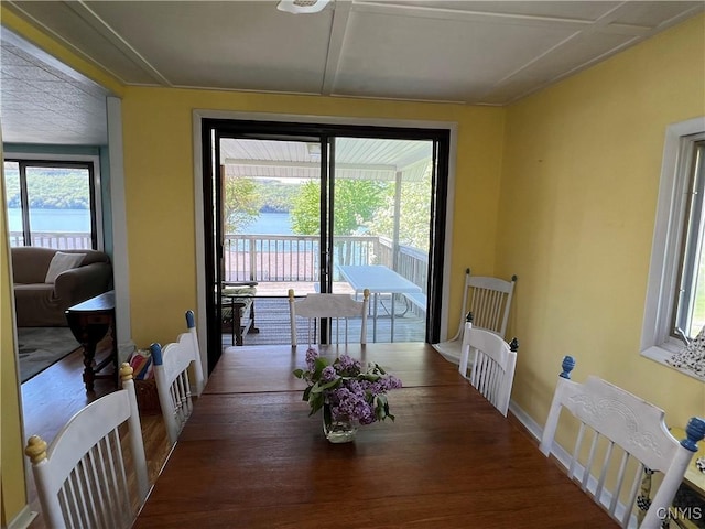 2055 Fitzgerald Pt S, Otisco, NY 13110 - dining space with wood finished floors and baseboards