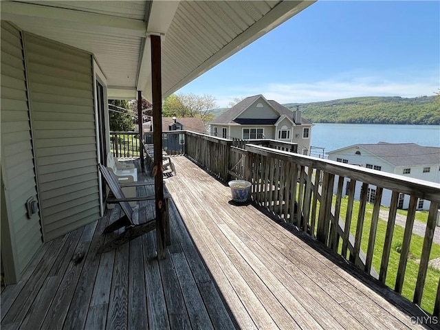 2055 Fitzgerald Pt S, Otisco, NY 13110 - wooden deck with a water view