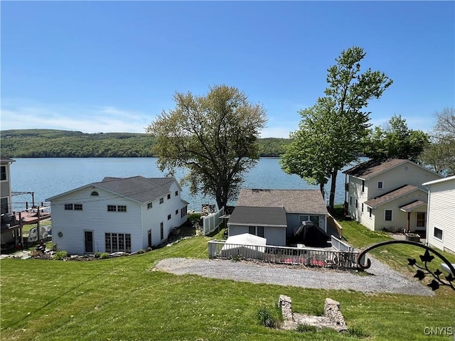 2055 Fitzgerald Pt S, Otisco, NY 13110 - view from above of property with a large body of water and a heavily wooded area