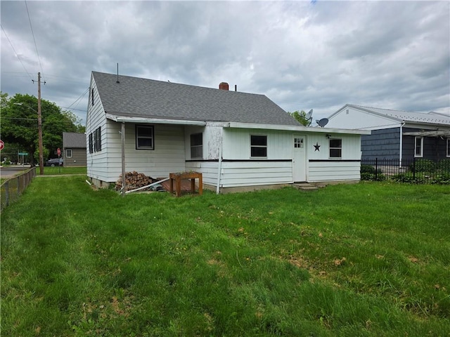 206 Pritchard Ave, Corning City, NY 14830 - back of property with roof with shingles and a chimney