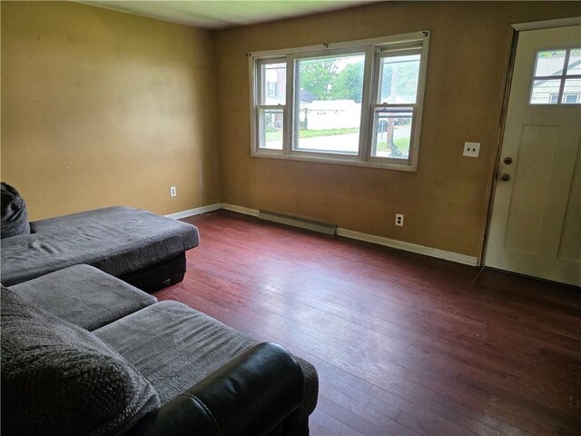 206 Pritchard Ave, Corning City, NY 14830 - living room with hardwood / wood-style flooring, baseboards, and a baseboard heating unit
