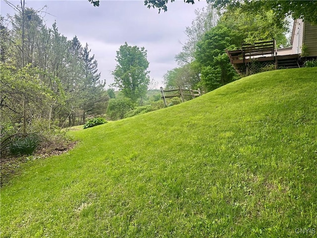 436 Mcgowan Rd, Frankfort, NY 13357 - view of grassy yard with a deck