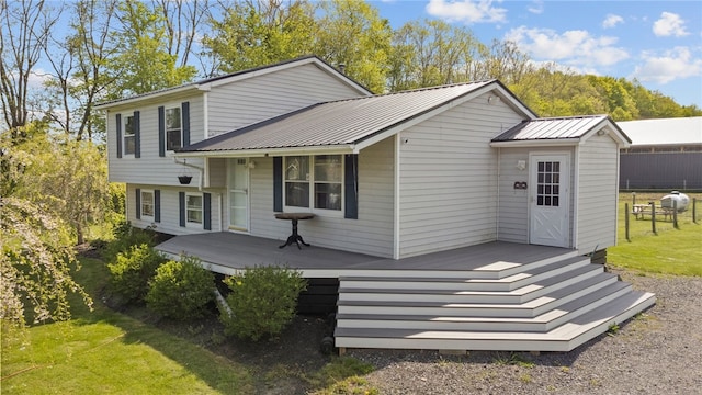 5904 Merrill Rd, Byron, NY 14422 - view of front of house featuring metal roof and a front yard
