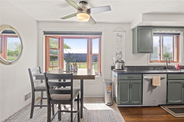 5904 Merrill Rd, Byron, NY 14422 - kitchen featuring dishwasher, a ceiling fan, a sink, a textured ceiling, and dark wood finished floors
