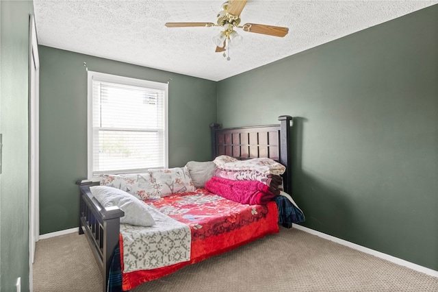 5904 Merrill Rd, Byron, NY 14422 - carpeted bedroom featuring a textured ceiling, a ceiling fan, and baseboards