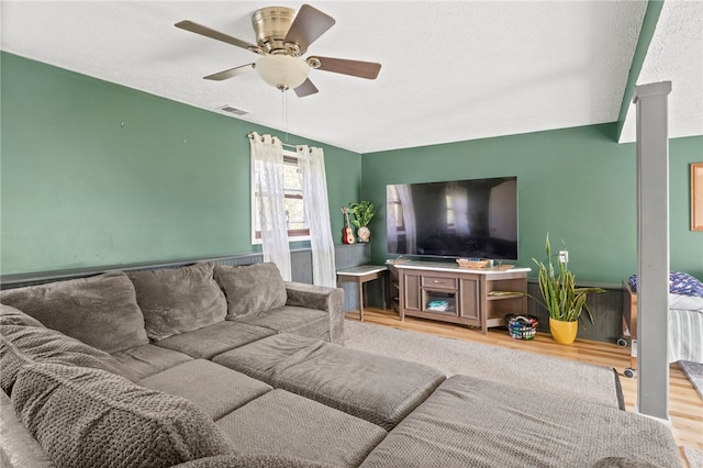 5904 Merrill Rd, Byron, NY 14422 - living area with wood finished floors and a ceiling fan