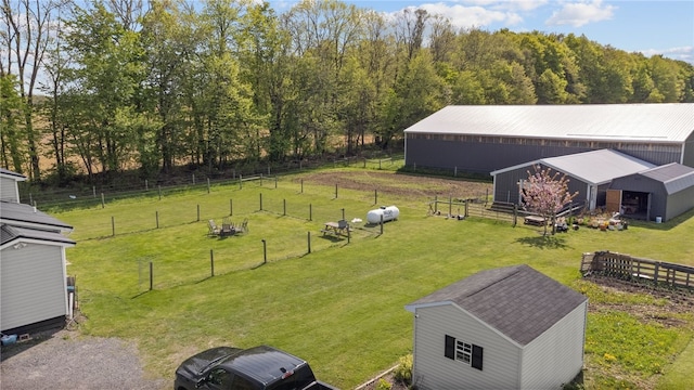 5904 Merrill Rd, Byron, NY 14422 - view of yard featuring an outbuilding and an exterior structure