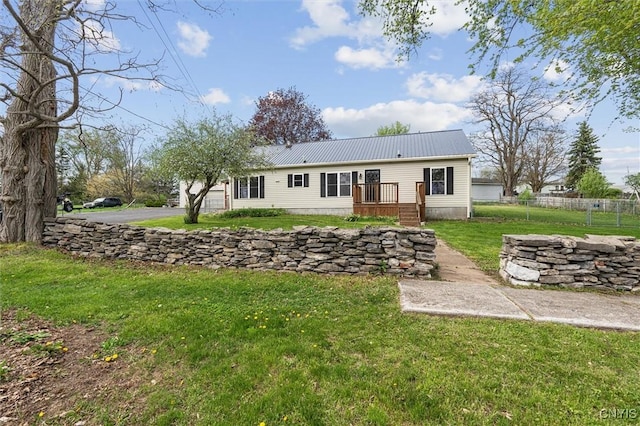 542 Lakeview Dr, Brownville, NY 13615 - back of property featuring metal roof and a deck