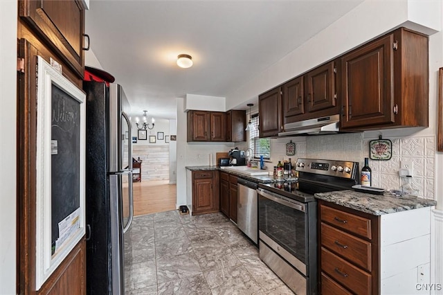 542 Lakeview Dr, Brownville, NY 13615 - kitchen featuring appliances with stainless steel finishes, under cabinet range hood, a sink, a chandelier, and dark brown cabinets