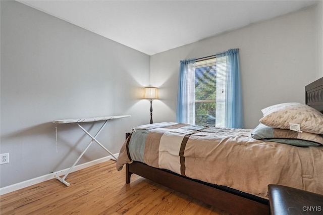 542 Lakeview Dr, Brownville, NY 13615 - bedroom featuring wood finished floors and baseboards