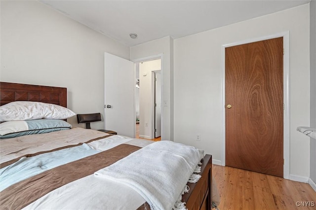 542 Lakeview Dr, Brownville, NY 13615 - bedroom featuring light wood finished floors and baseboards