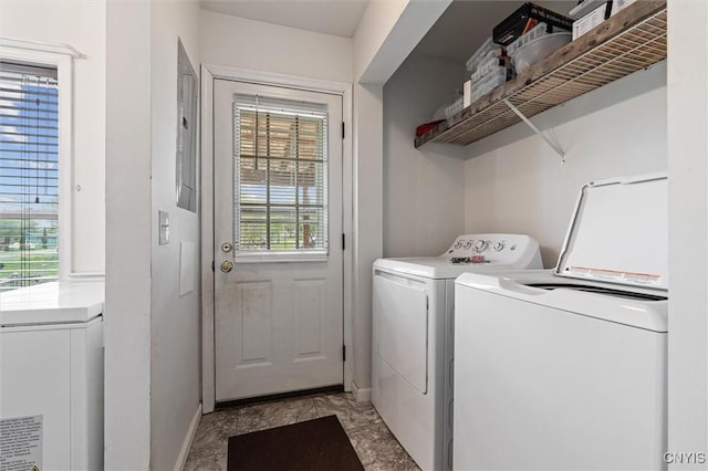 542 Lakeview Dr, Brownville, NY 13615 - clothes washing area featuring separate washer and dryer, baseboards, and light marble finish flooring