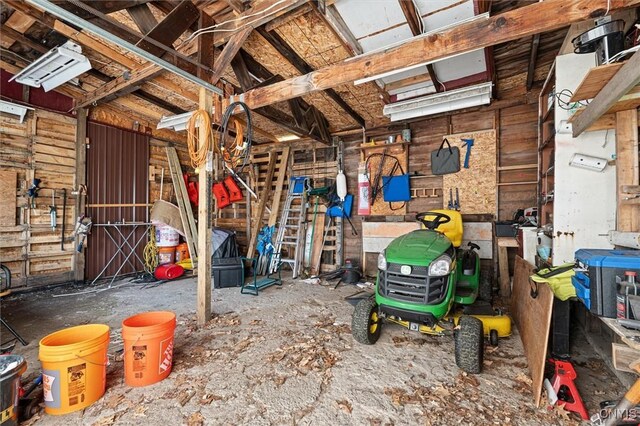 542 Lakeview Dr, Brownville, NY 13615 - misc room with a workshop area and a garage