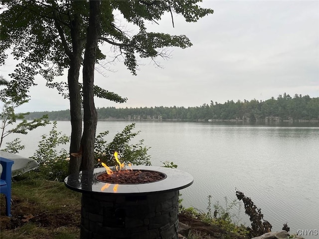 39498 Hyde Lake Rd, Theresa, NY 13691 - water view with an outdoor fire pit and a heavily wooded area