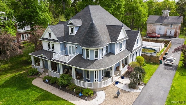976 River Rd, Porter, NY 14174 - rear view of property featuring a porch, a balcony, and a shingled roof