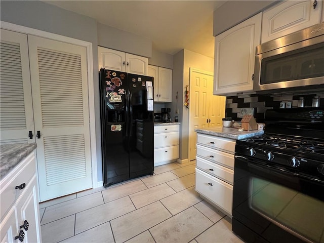 427 Church St, Winfield, NY 13491 - kitchen with black appliances, white cabinets, light tile patterned flooring, and decorative backsplash
