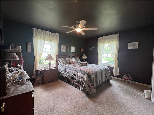 427 Church St, Winfield, NY 13491 - carpeted bedroom with a ceiling fan