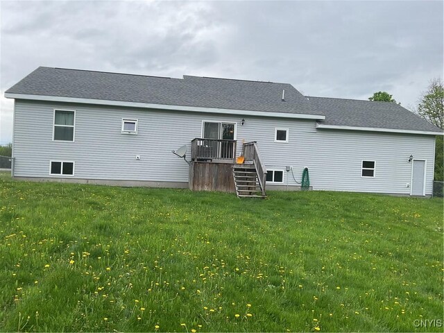 27892 Nys Rte 37, Pamelia, NY 13601 - back of property featuring stairway, a lawn, a wooden deck, and a shingled roof