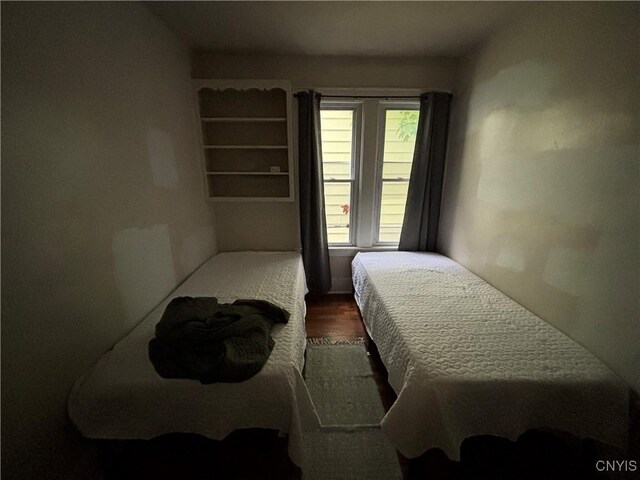 513 Tennyson Ave Unit 15, Syracuse, NY 13204 - bedroom with dark wood-type flooring
