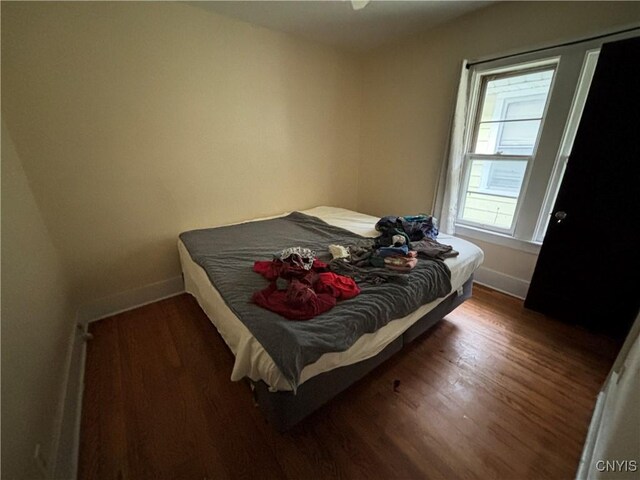 513 Tennyson Ave Unit 15, Syracuse, NY 13204 - bedroom featuring wood finished floors and baseboards
