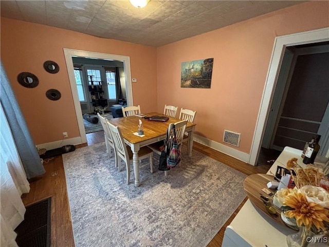 513 Tennyson Ave Unit 15, Syracuse, NY 13204 - dining area featuring wood finished floors and baseboards