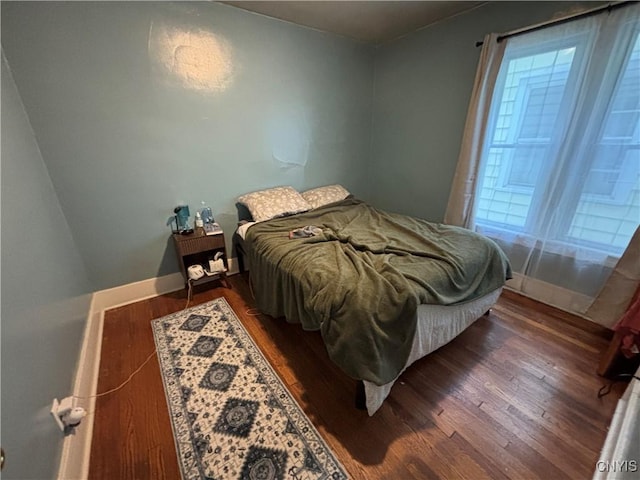 513 Tennyson Ave Unit 15, Syracuse, NY 13204 - bedroom with wood finished floors and baseboards