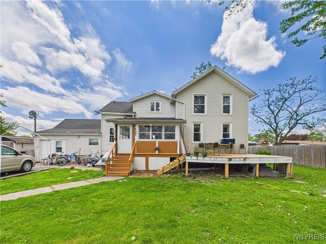 1847 Tuscarora Rd, Niagara, NY 14304 - back of property featuring a deck and a sunroom