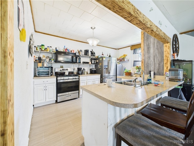 1847 Tuscarora Rd, Niagara, NY 14304 - kitchen featuring appliances with stainless steel finishes, a sink, a kitchen breakfast bar, a peninsula, and open shelves