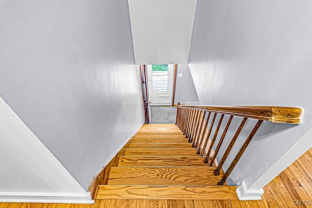 14 Gridley Pl, Paris, NY 13456 - staircase with wood finished floors and baseboards