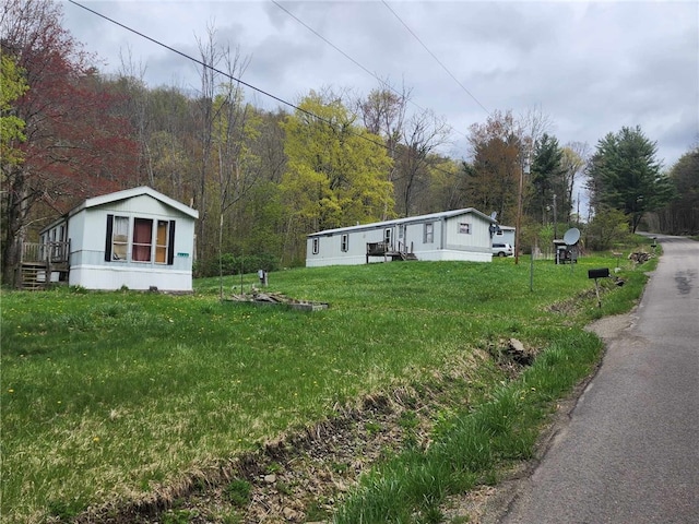 5123 Wixon Rd Unit 3, Campbell, NY 14870 - view of grassy yard featuring a view of trees
