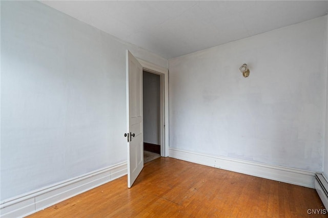 8 Washington St, Alexandria, NY 13607 - spare room featuring light wood-style flooring, baseboards, and baseboard heating