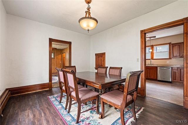 8 Washington St, Alexandria, NY 13607 - dining area featuring dark wood-style flooring and baseboards