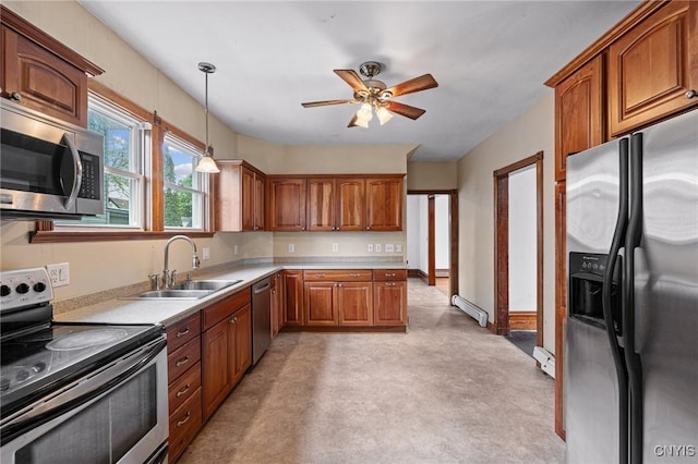 8 Washington St, Alexandria, NY 13607 - kitchen featuring stainless steel appliances, baseboard heating, a sink, brown cabinetry, and ceiling fan