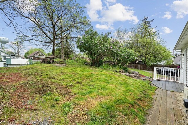 8 Washington St, Alexandria, NY 13607 - view of yard featuring a deck