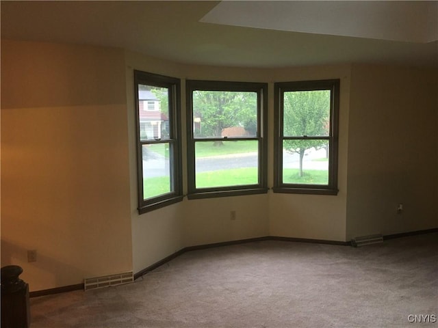 7653 Windsor Dr N, Clay, NY 13212 - spare room with carpet floors and baseboards