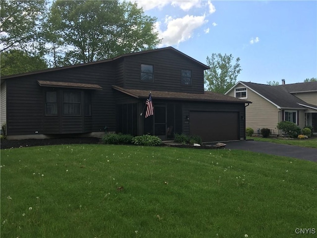7653 Windsor Dr N, Clay, NY 13212 - view of front of property featuring driveway and a front lawn