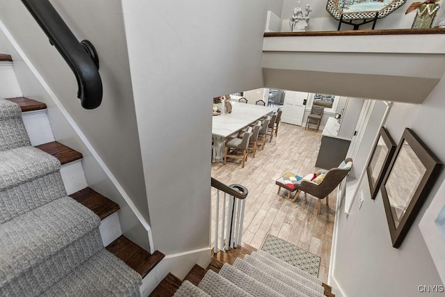 3721 Cold Springs Rd, Lysander, NY 13027 - stairs featuring wood finished floors