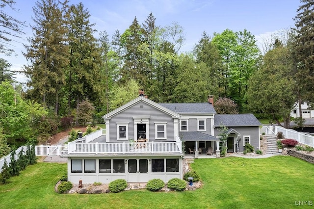 3721 Cold Springs Rd, Lysander, NY 13027 - back of house featuring a chimney, a shingled roof, a patio area, and stairs