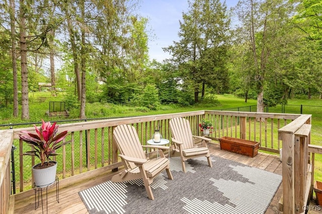 3721 Cold Springs Rd, Lysander, NY 13027 - wooden deck featuring view of wooded area