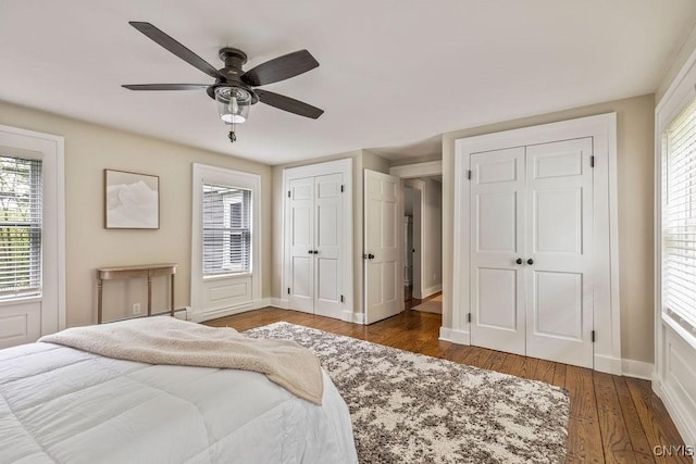 3721 Cold Springs Rd, Lysander, NY 13027 - bedroom with two closets, wood finished floors, baseboards, and ceiling fan
