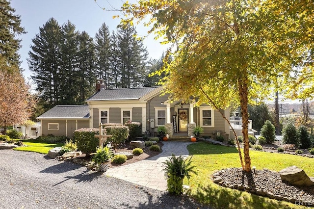 3721 Cold Springs Rd, Lysander, NY 13027 - view of front of house featuring a front yard and a chimney