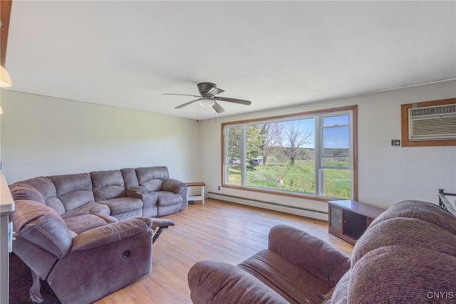 living room with a baseboard radiator, a wall mounted AC, light wood-style floors, and ceiling fan