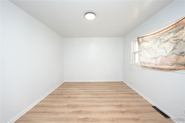 8 Wagner Ave, Cheektowaga, NY 14206 - spare room with light wood-type flooring and baseboards