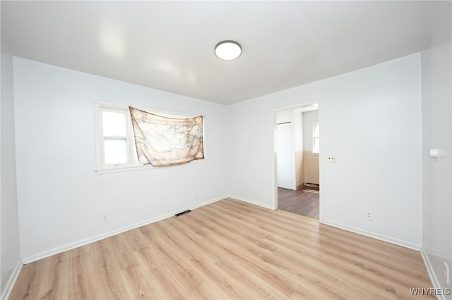 8 Wagner Ave, Cheektowaga, NY 14206 - unfurnished room featuring light wood-type flooring and baseboards